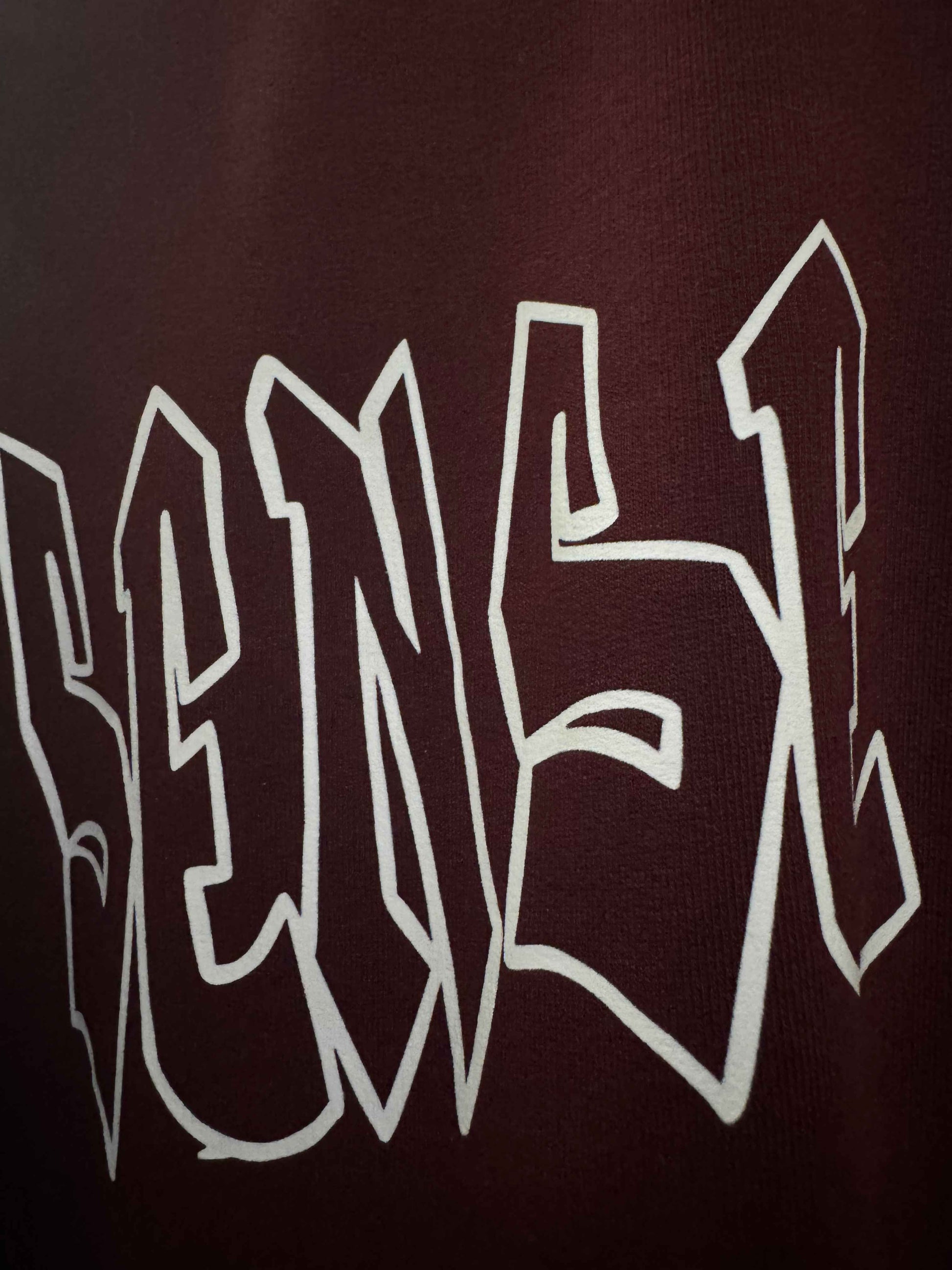Close-up of maroon 240 GSM French Terry cotton fabric quality – Sense of Street basics.