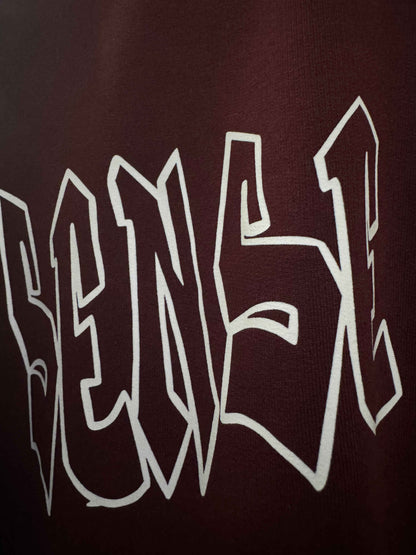 Close-up of maroon 240 GSM French Terry cotton fabric quality – Sense of Street basics.