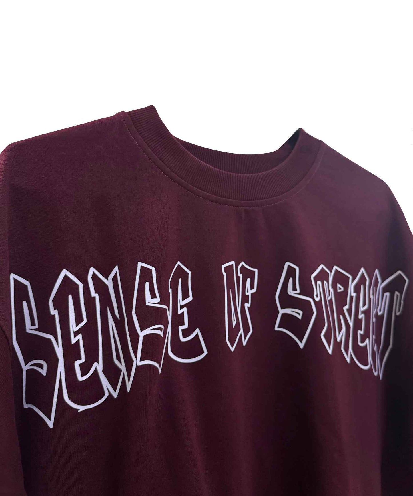 Maroon plain oversized tee flatlay – Minimalist unisex streetwear staple India.