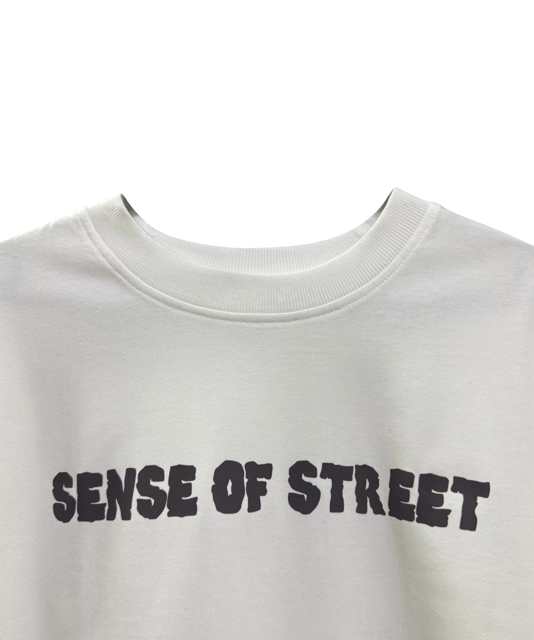 Faces of the Street white oversized t-shirt front view with SENSE OF STREET text – Premium 240 GSM tee.