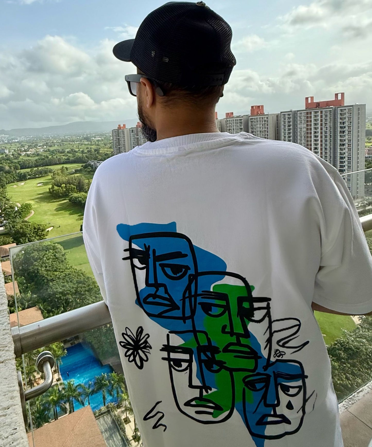 Model wearing the Faces of the Street oversized white tee – Contemporary urban fashion inspiration India.