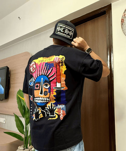 Model styling the Future Kills oversized t-shirt for an urban underground streetwear look.