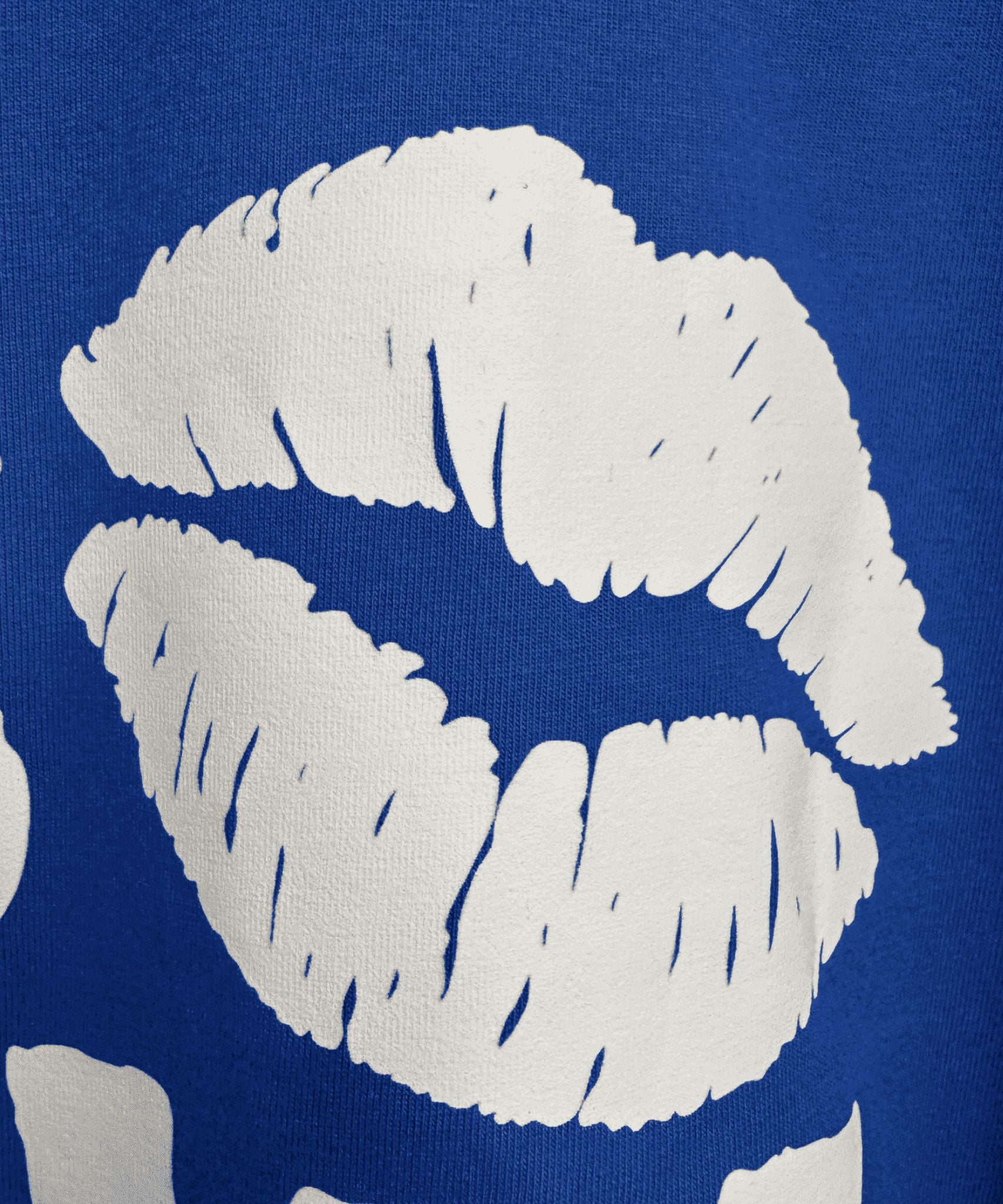 Detailed view of Kiss Now Chaos Later premium screen print on blue fabric - Sense of Street.
