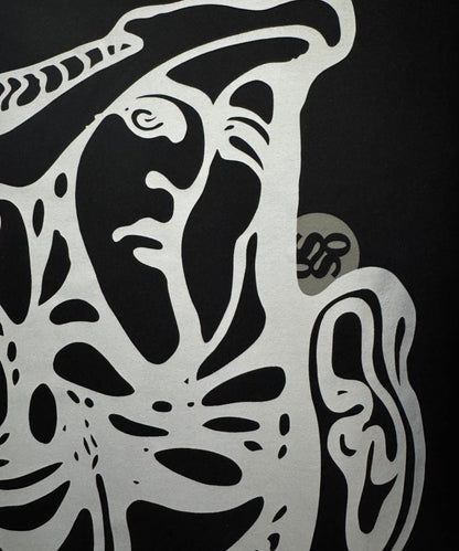 Side profile of Sense of Street Art Chaos tee showing drop shoulder fit