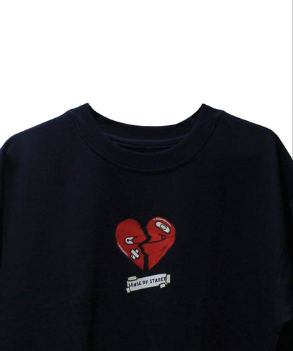 Front view of Pearl Blue oversized t-shirt with cracked heart graphic – Sense of Street.